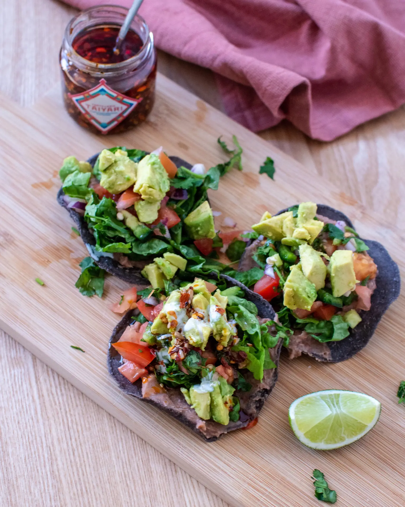 Refried bean tostadas with tostadas taiyari